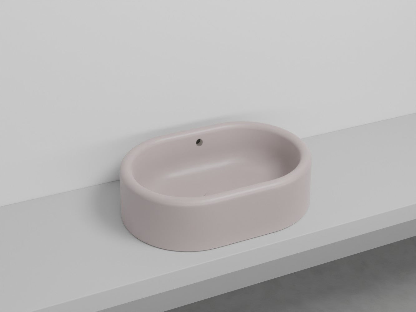 # LAVABO OVALE DA APPOGGIO ITACA con TROPPOPIENO - CIELO in ceramica con finiture pregiate e stile moderno