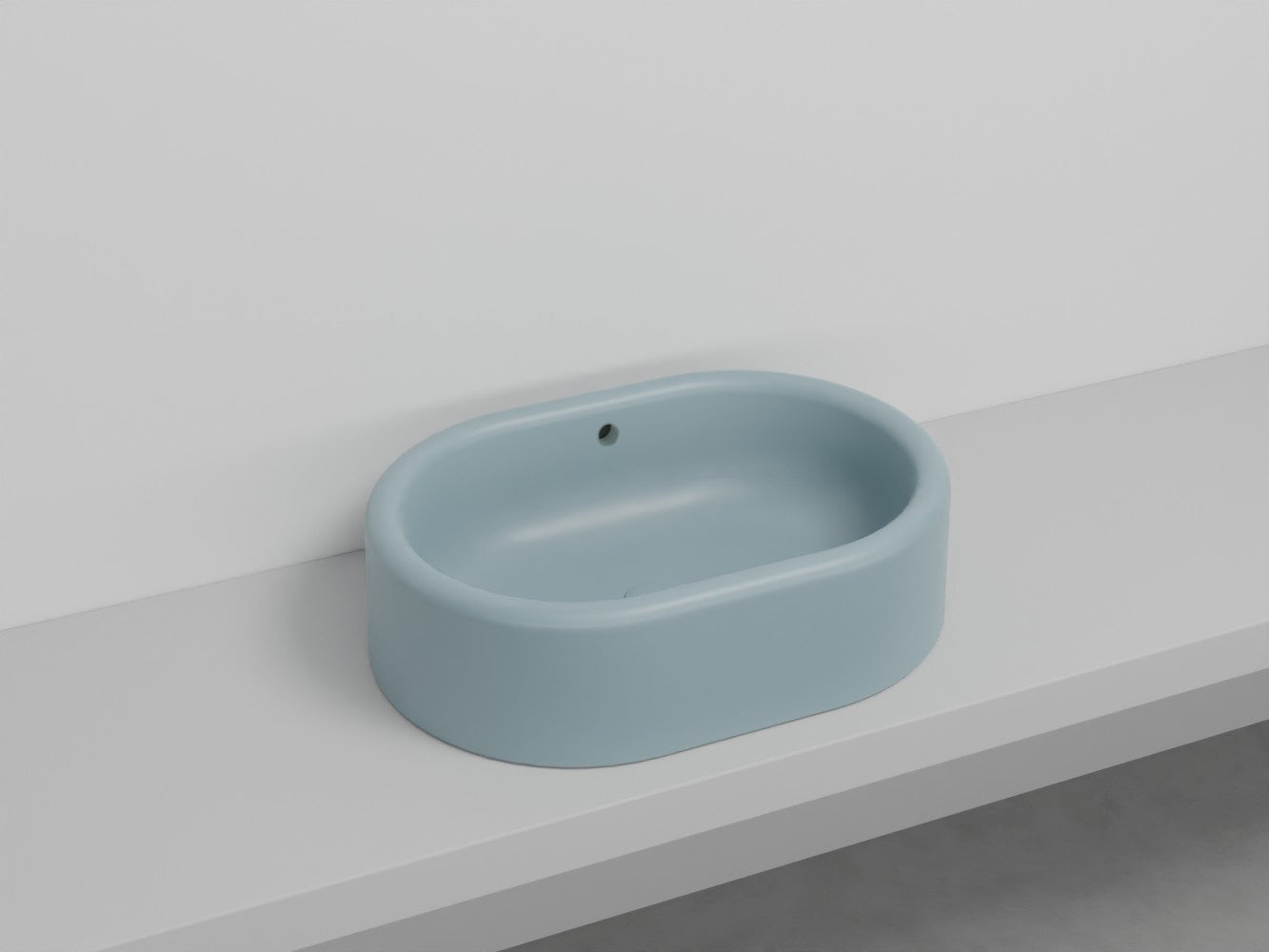 # LAVABO OVALE DA APPOGGIO ITACA con TROPPOPIENO - CIELO in ceramica con finiture pregiate e stile moderno