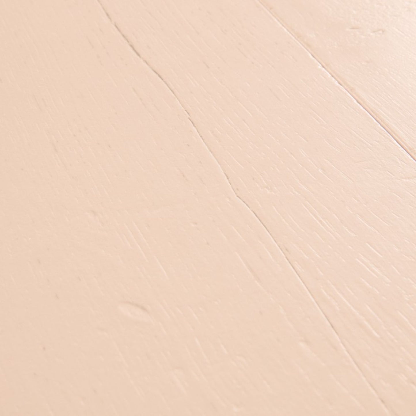 Pavimento in Laminato CAPTURE ROVERE TINTO ROSATO QUICK-STEP è pensato per ambienti che richiedono una tonalità calda ma controllata