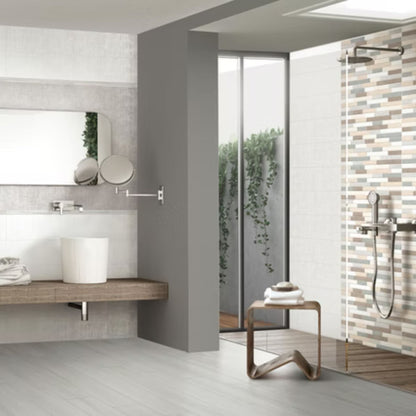 ANTHOLOGY SAVOIA ITALIA rivestimenti in bicottura in pasta bianca effetto cemento decorato per pareti bagno e living