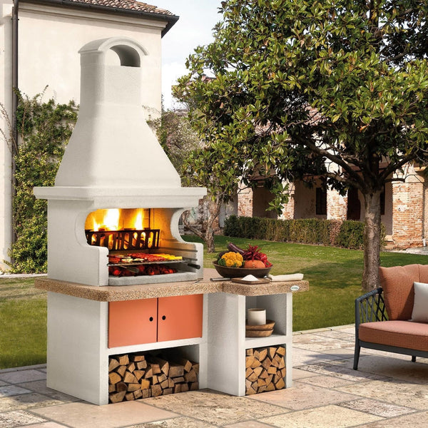 Barbecue a legna in cemento GALLIPOLI ROSSO per giardino - PALAZZETTI con piano Marmotech, focolare rinforzato, sistema Fast-Fire Box