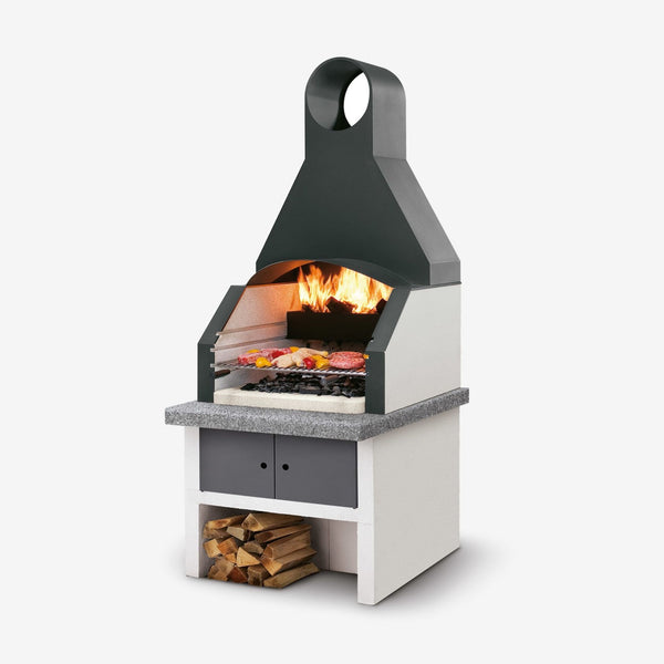 Barbecue a legna in cemento MAXIME CAPPA INOX per giardino - PALAZZETTI con piano Marmotech, vano con antine e doppio caricamento legna