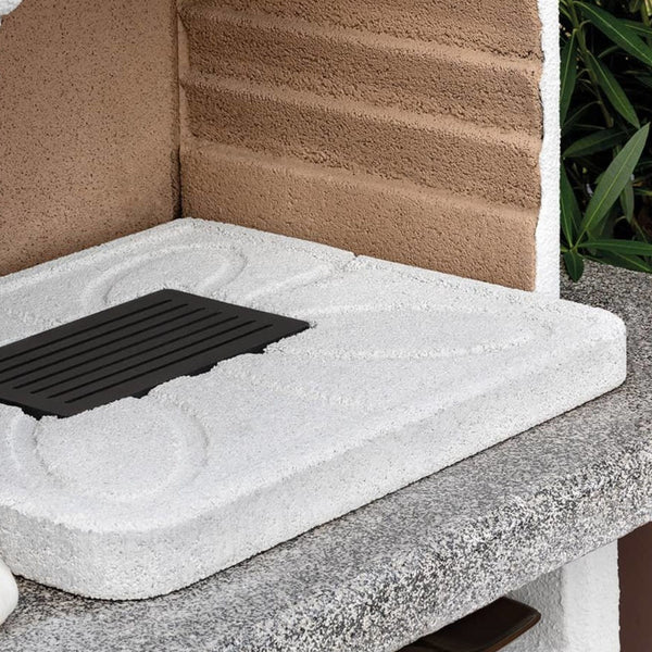 Barbecue a legna in cemento SALINA - PALAZZETTI con griglia regolabile, piano Marmotech e cassetto cenere Fast-Fire Box