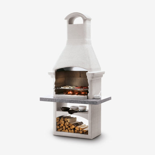 Barbecue a legna in cemento SALINA - PALAZZETTI con griglia regolabile, piano Marmotech e cassetto cenere Fast-Fire Box