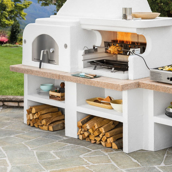 Barbecue in cemento a legna GARGANO ROSSO CON FORNO e GRIGLIA - PALAZZETTI ideale per pane, pizza e grigliate in giardino