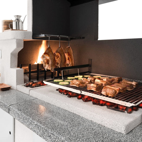 Barbecue in cemento a legna TRINIDAD con griglia extra large - PALAZZETTI braciere laterale, piano Marmotech e struttura in cemento