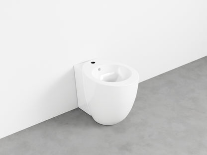 # BIDET A TERRA FILO MURO LE GIARE in ceramica - CIELO dal design sinuoso e le sue forme ovali continue e armoniche