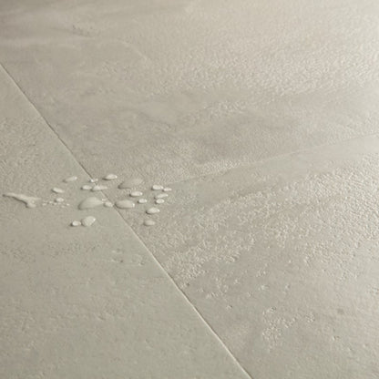 Pavimento in Laminato CAPTURE MUSE CEMENTO GRIGIO QUICK-STEP resistenza ai graffi e design effetto pietra per ambienti domestici ad alto utilizzo