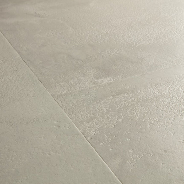 Pavimento in Laminato CAPTURE MUSE CEMENTO GRIGIO QUICK-STEP resistenza ai graffi e design effetto pietra per ambienti domestici ad alto utilizzo