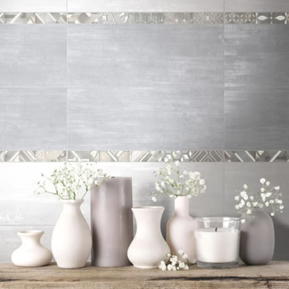 ETOILE SAVOIA ITALIA rivestimenti in bicottura in pasta bianca effetto cemento e muretto decorato per pareti bagno e living