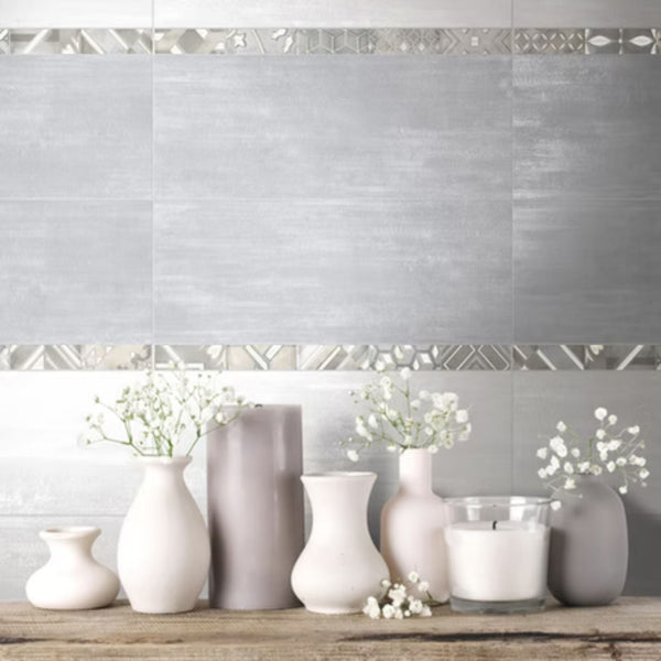 ETOILE SAVOIA ITALIA rivestimenti in bicottura in pasta bianca effetto cemento e muretto decorato per pareti bagno e living