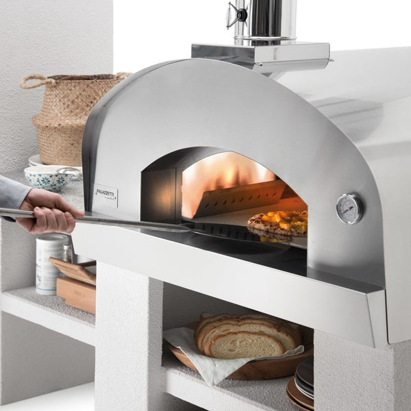 Forno a legna da appoggio CARMINE in acciaio inox - PALAZZETTI camera a volta e isolamento in lana di roccia
