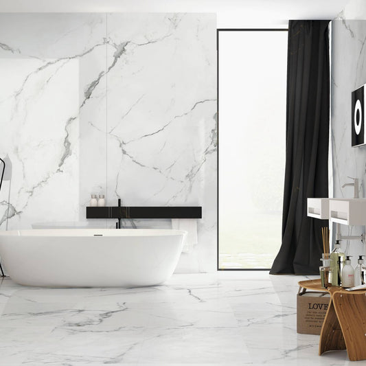 INFINITO 2.0 FONDOVALLE Marmi total black, grigi look naturale, marroni e bianchi dalle texture variegate e venature ampie