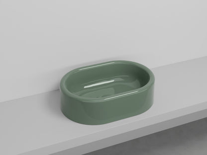 # LAVABO OVALE DA APPOGGIO ITACA - CIELO in ceramica con finiture pregiate e stile moderno