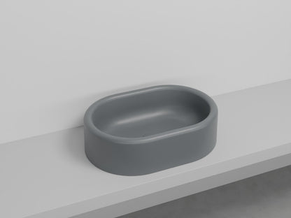 # LAVABO OVALE DA APPOGGIO ITACA - CIELO in ceramica con finiture pregiate e stile moderno