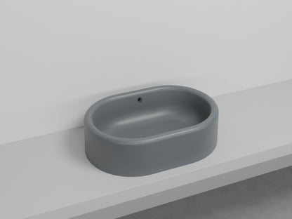 # LAVABO OVALE DA APPOGGIO ITACA con TROPPOPIENO - CIELO in ceramica con finiture pregiate e stile moderno