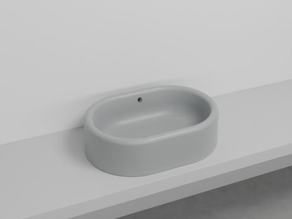 # LAVABO OVALE DA APPOGGIO ITACA con TROPPOPIENO - CIELO in ceramica con finiture pregiate e stile moderno