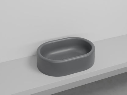 # LAVABO OVALE DA APPOGGIO ITACA - CIELO in ceramica con finiture pregiate e stile moderno