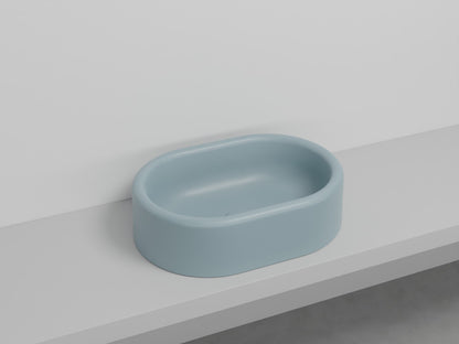 # LAVABO OVALE DA APPOGGIO ITACA - CIELO in ceramica con finiture pregiate e stile moderno