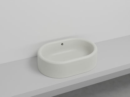 # LAVABO OVALE DA APPOGGIO ITACA con TROPPOPIENO - CIELO in ceramica con finiture pregiate e stile moderno