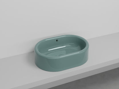 # LAVABO OVALE DA APPOGGIO ITACA con TROPPOPIENO - CIELO in ceramica con finiture pregiate e stile moderno