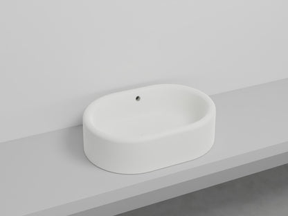 # LAVABO OVALE DA APPOGGIO ITACA con TROPPOPIENO - CIELO in ceramica con finiture pregiate e stile moderno