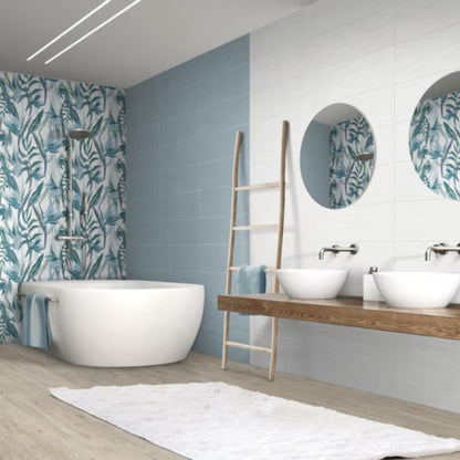 NUANCE SAVOIA ITALIA rivestimenti in bicottura in pasta bianca con superfici materiche e decorazioni per ambienti bagno e living