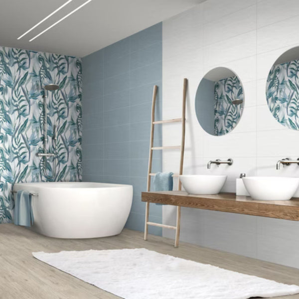 NUANCE SAVOIA ITALIA rivestimenti in bicottura in pasta bianca con superfici materiche e decorazioni per ambienti bagno e living