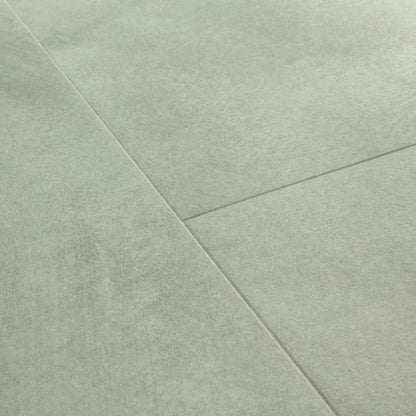 Pavimento in PVC ILLUME VERDE SOFT QUICK-STEP finitura effetto pietra con bisellatura naturale
