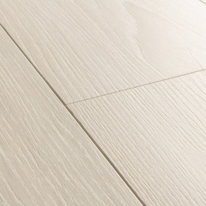 Pavimento in Laminato CAPTURE ROVERE PREMIUM BIANCO QUICK-STEP offre una tonalità luminosa e naturale valorizza spazi piccoli o poco illuminati