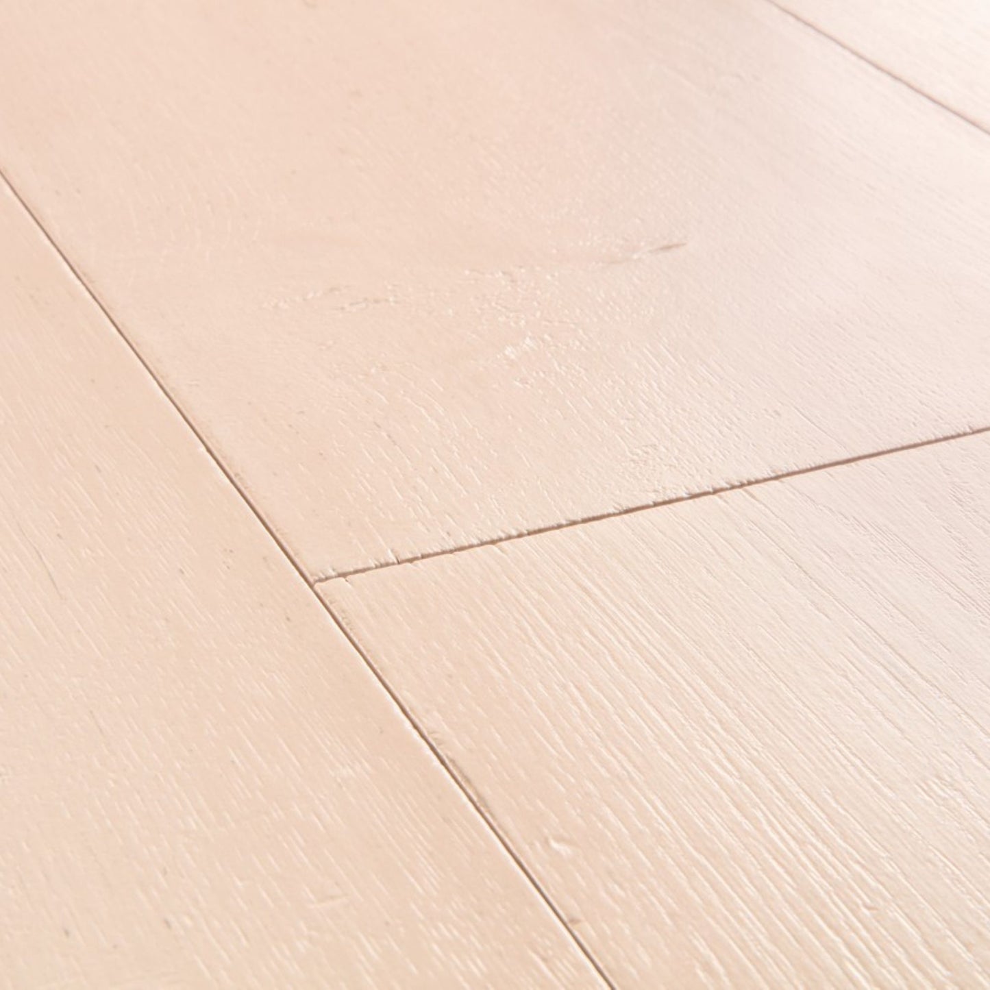 Pavimento in Laminato CAPTURE ROVERE TINTO ROSATO QUICK-STEP è pensato per ambienti che richiedono una tonalità calda ma controllata