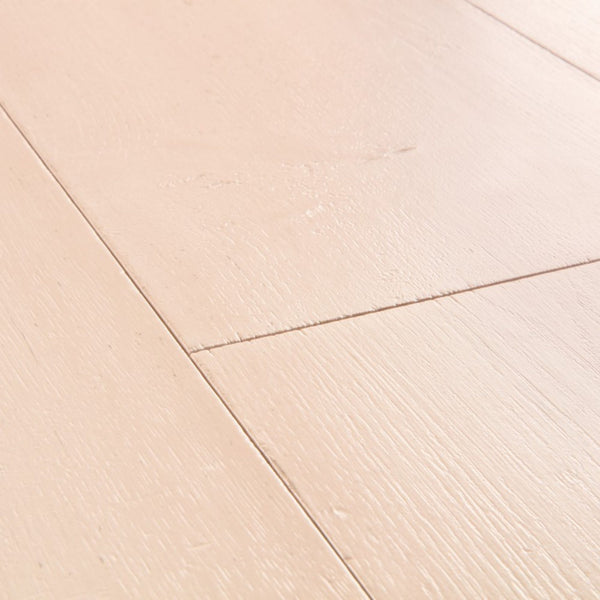 Pavimento in Laminato CAPTURE ROVERE TINTO ROSATO QUICK-STEP è pensato per ambienti che richiedono una tonalità calda ma controllata