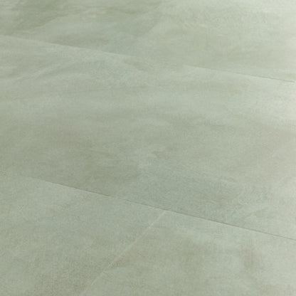 Pavimento in PVC ILLUME VERDE SOFT QUICK-STEP finitura effetto pietra con bisellatura naturale