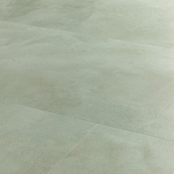 Pavimento in PVC ILLUME VERDE SOFT QUICK-STEP finitura effetto pietra con bisellatura naturale