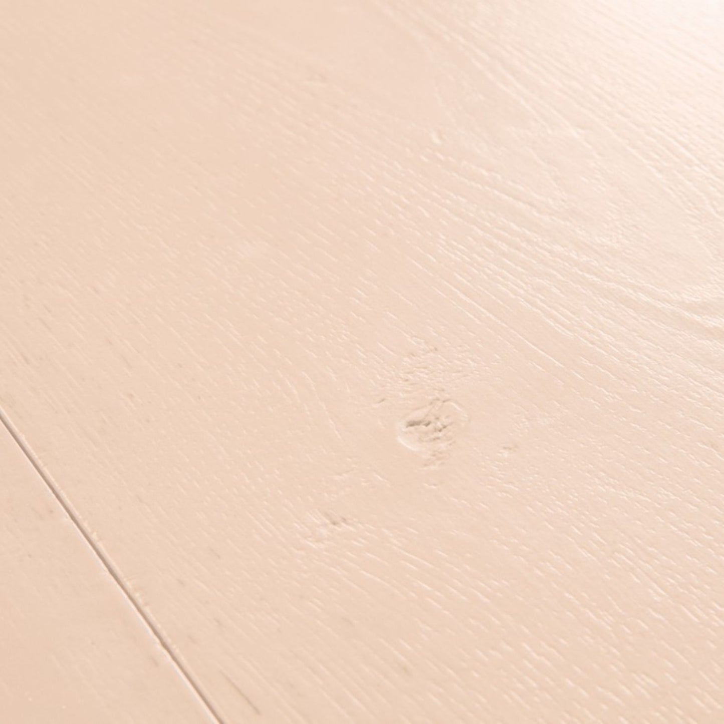 Pavimento in Laminato CAPTURE ROVERE TINTO ROSATO QUICK-STEP è pensato per ambienti che richiedono una tonalità calda ma controllata
