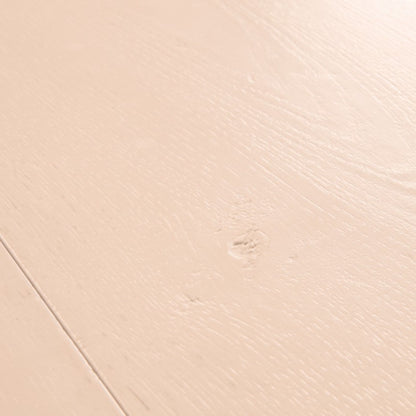 Pavimento in Laminato CAPTURE ROVERE TINTO ROSATO QUICK-STEP è pensato per ambienti che richiedono una tonalità calda ma controllata