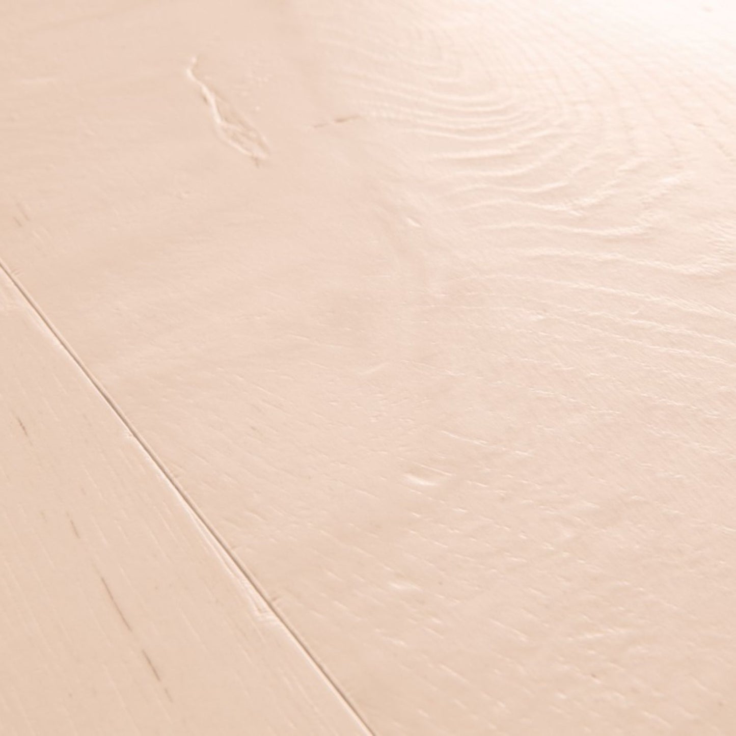 Pavimento in Laminato CAPTURE ROVERE TINTO ROSATO QUICK-STEP è pensato per ambienti che richiedono una tonalità calda ma controllata