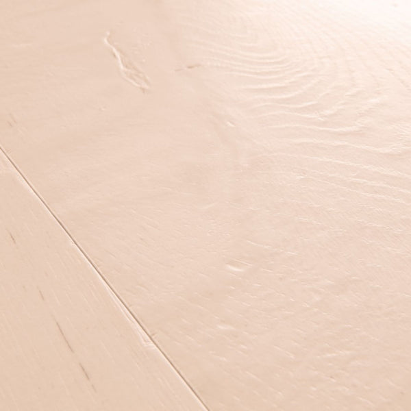 Pavimento in Laminato CAPTURE ROVERE TINTO ROSATO QUICK-STEP è pensato per ambienti che richiedono una tonalità calda ma controllata