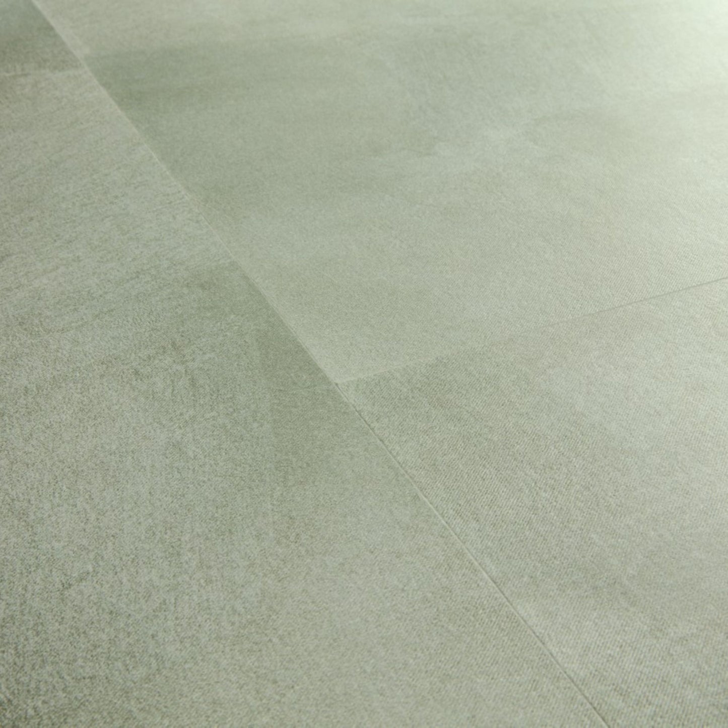 Pavimento in PVC ILLUME VERDE SOFT QUICK-STEP finitura effetto pietra con bisellatura naturale