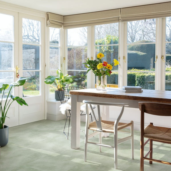 Pavimento in PVC ILLUME VERDE SOFT QUICK-STEP finitura effetto pietra con bisellatura naturale