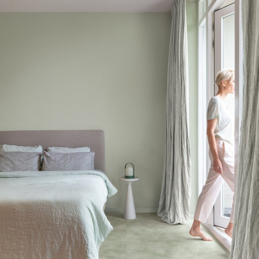 Pavimento in PVC ILLUME VERDE SOFT QUICK-STEP finitura effetto pietra con bisellatura naturale