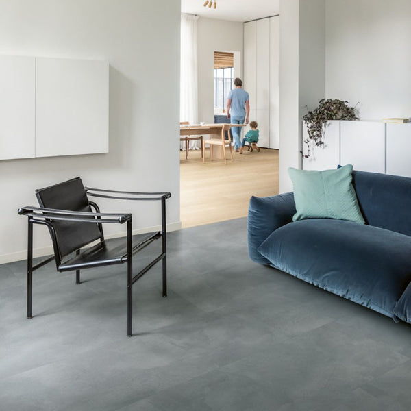 Pavimento in PVC ILLUME AZZURRO SOFT QUICK-STEP effetto pietra con piastrella media impermeabile e posa Uniclic