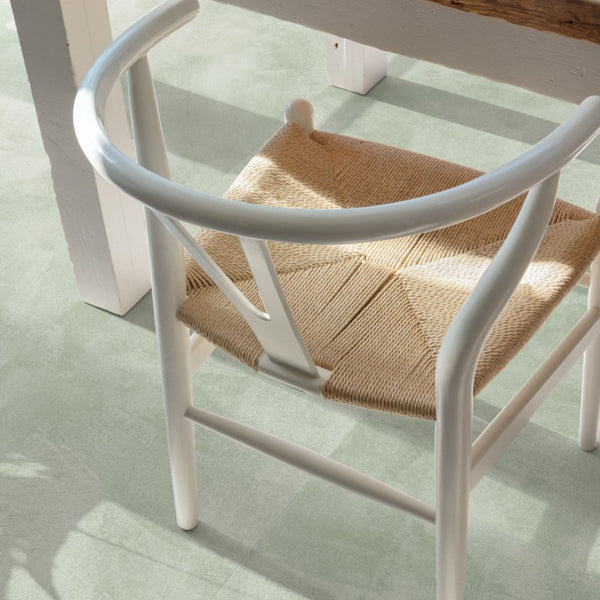 Pavimento in PVC ILLUME VERDE SOFT QUICK-STEP finitura effetto pietra con bisellatura naturale
