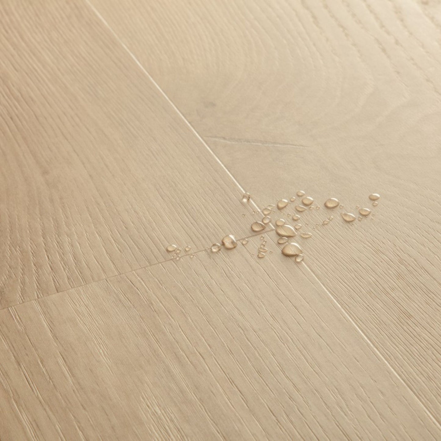 Pavimento in PVC BLOS BASE ROVERE SABBIA DELLA COSTA QUICK-STEP finitura effetto legno rovere in tonalità beige sabbia