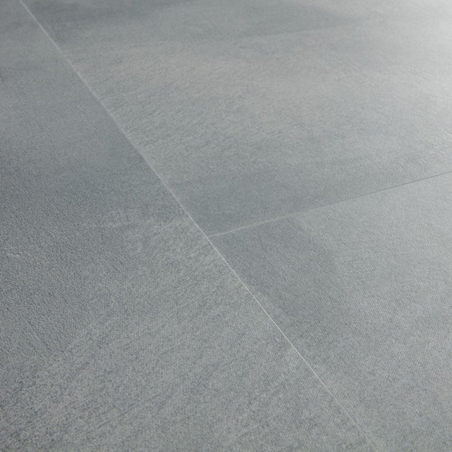 Pavimento in PVC ILLUME AZZURRO SOFT QUICK-STEP effetto pietra con piastrella media impermeabile e posa Uniclic