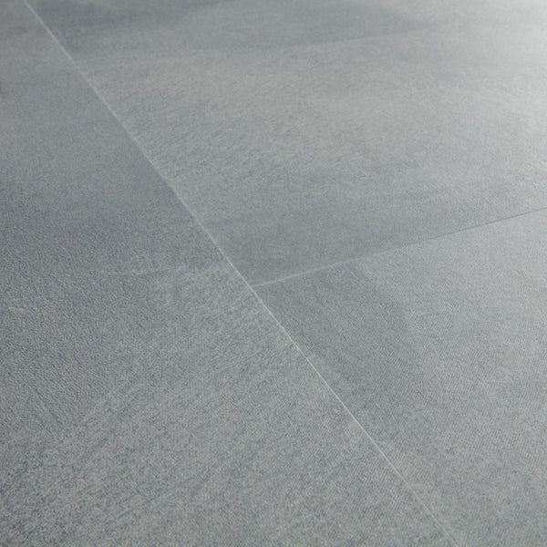 Pavimento in PVC ILLUME AZZURRO SOFT QUICK-STEP effetto pietra con piastrella media impermeabile e posa Uniclic