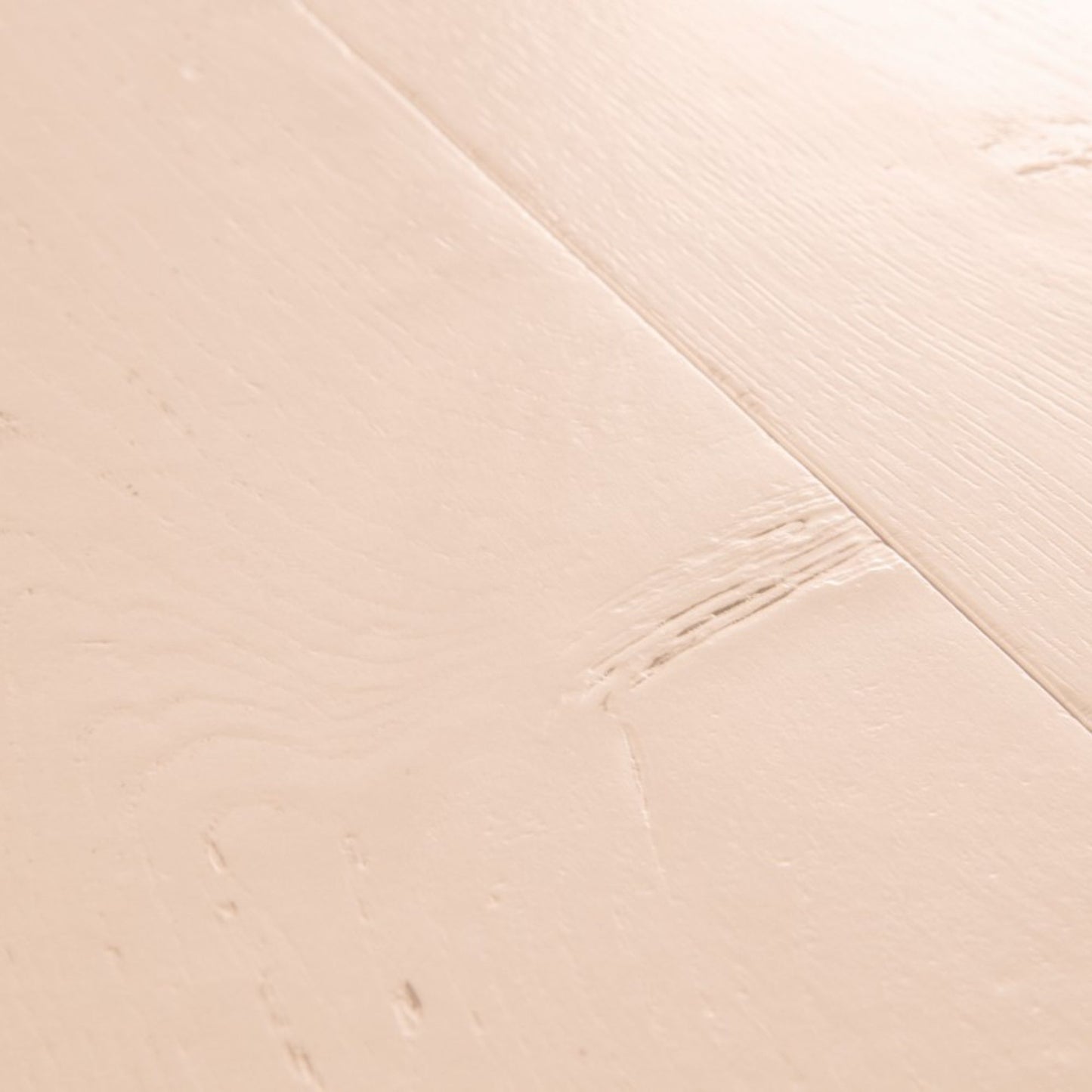 Pavimento in Laminato CAPTURE ROVERE TINTO ROSATO QUICK-STEP è pensato per ambienti che richiedono una tonalità calda ma controllata