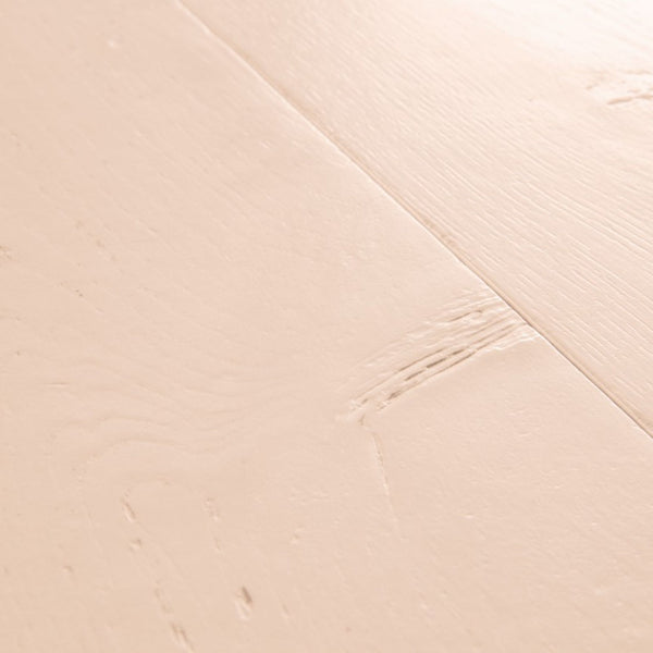Pavimento in Laminato CAPTURE ROVERE TINTO ROSATO QUICK-STEP è pensato per ambienti che richiedono una tonalità calda ma controllata