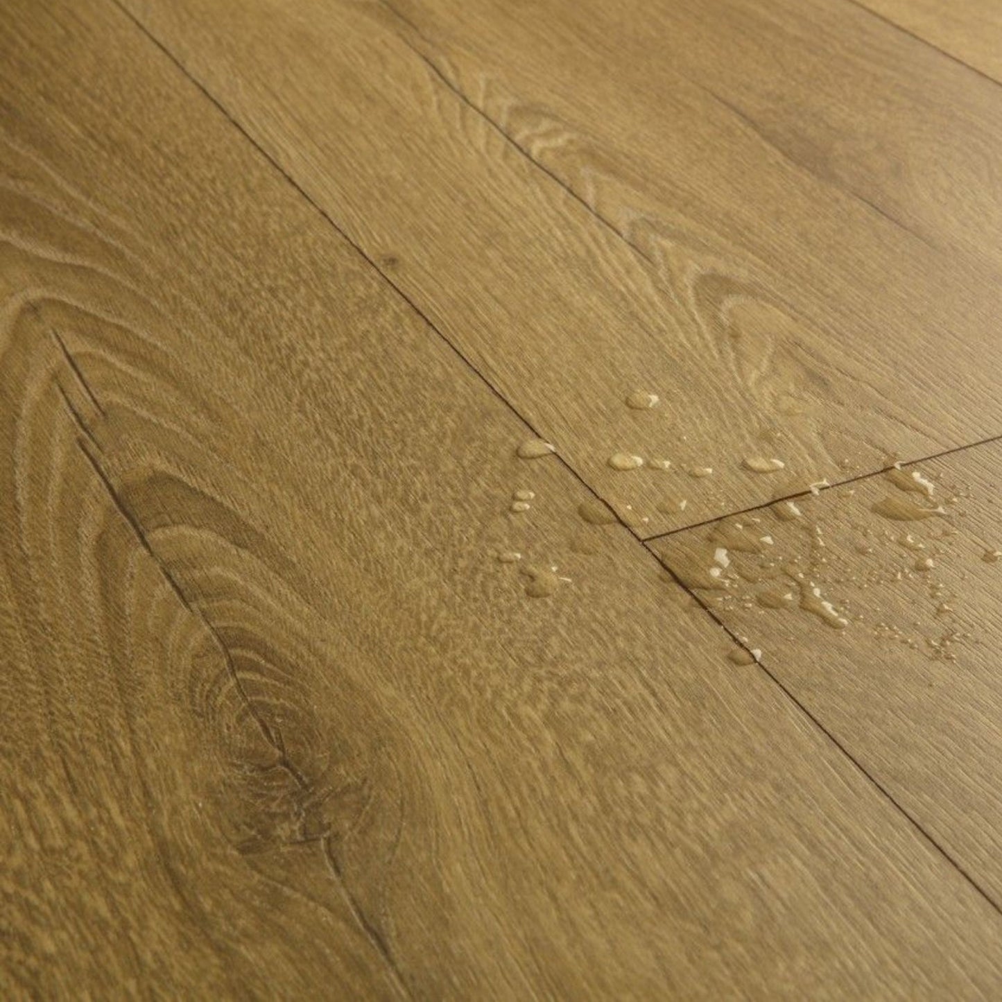 Pavimento in Laminato CLASSIC ROVERE MIELE D'ACACIA QUICK-STEP impermeabile al 100% con sistema Uniclic, compatibile con riscaldamento a pavimento