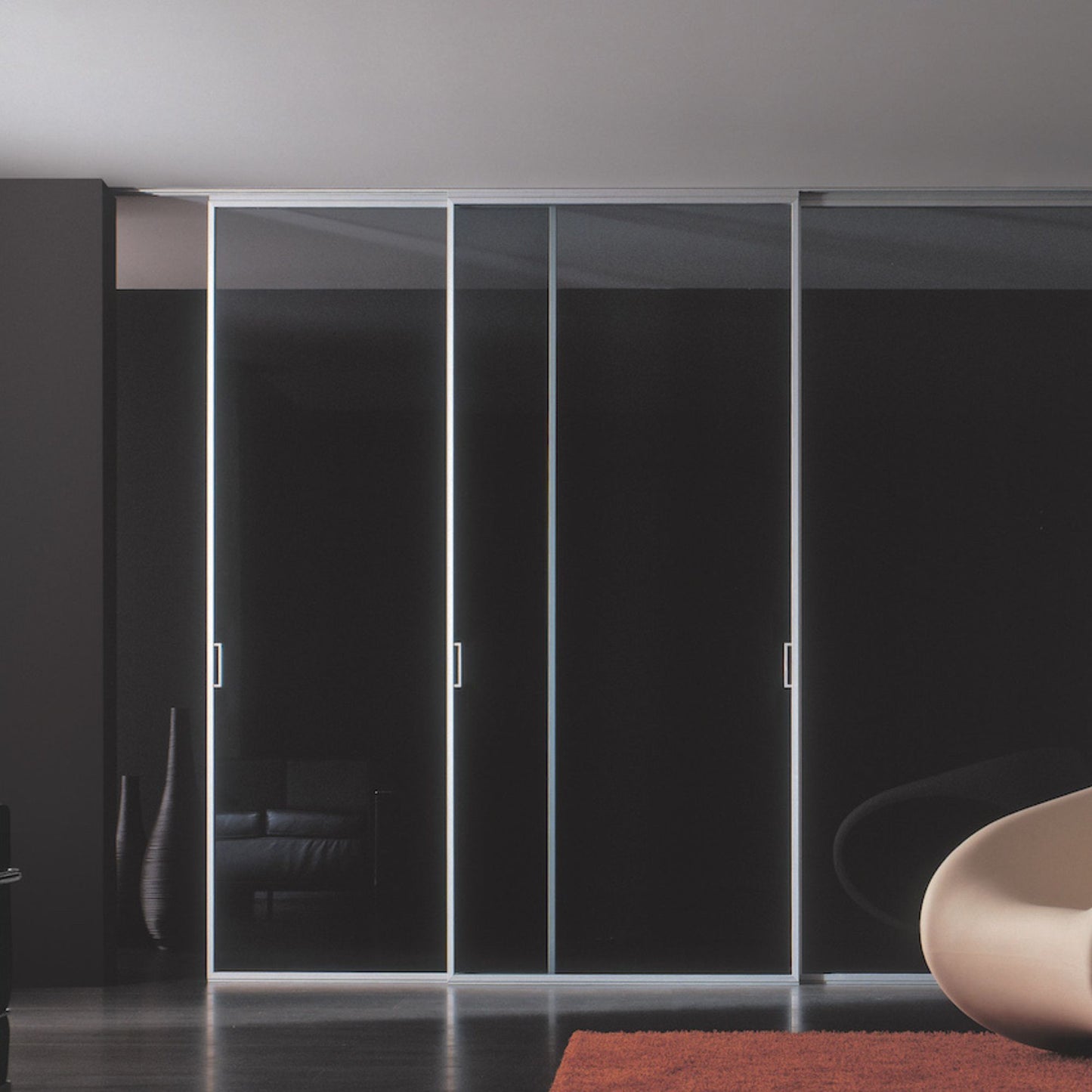 # PORTA LUNA - RES ITALIA Sistema con telaio ridotto in alluminio e ampia gamma di vetri personalizzabili
